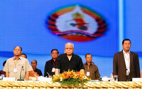 From left to right, Cambodian People's Party (CPP) National Assembly President Heng Samrin, CPP Senate President Chea Sim and CPP Prime Minister Hun Sen attend the first day of their party's annual two-day congress in Phnom Penh on Saturday. (Siv Channa)