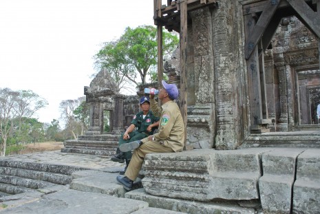 A Preah Vihear Authority conservation ranger drinks water. (Simon Lewis/The Cambodia Daily)