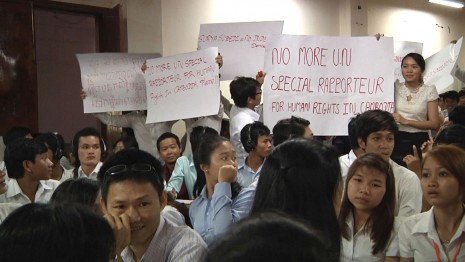 Students hold up banners Tuesday night calling for an end to the mandate of Surya Subedi, the U.N. human rights envoy to Cambodia. The student protest, an extremely rare occurrence, took place during a lecture on international investment law by Mr. Subedi at the Cambodia Mekong University in Phnom Penh.