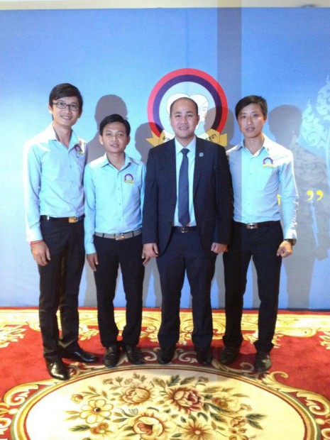 Union of Youth Federations of Cambodia (UYFC) president and Prime Minister Hun Sen's son, Hun Many, center right, poses with Chea Chheng, right, and other UYFC supporters in this undated photograph.