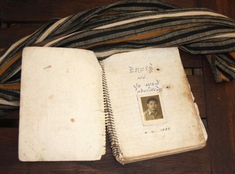 The first page of the diary of Poch Yuonly, who died under the Khmer Rouge, is displayed. Donated to the Documentation Center of Cambodia, it describes the hardships suffered by his family under the regime. (DC-Cam)