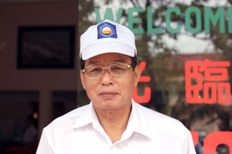 Former Prime Minister and Cambodia National Rescue Party lawmaker candidate Pen Sovann stands outside a guesthouse in Phnom Penh on Wednesday. (Alex Willemyns/The Cambodia Daily)