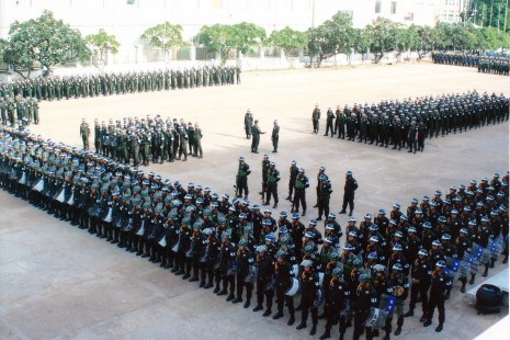 Military police officers conduct exercises in crowd control and riot response tactics on Saturday at Phnom Penh's Olympic Stadium. The opposition CNRP has repeatedly threatened a mass demonstration if an independent inquiry into irregularities during the July 28 national election is not carried out.