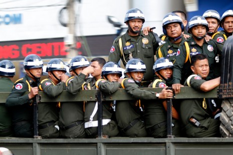 A truck packed with military police arrives at Olympic Stadium in Phnom Penh on Tuesday where more than 500 officers from across the country gathered to conduct drills in riot gear ahead of demonstrations planned by the opposition on Saturday. (Siv Channa)