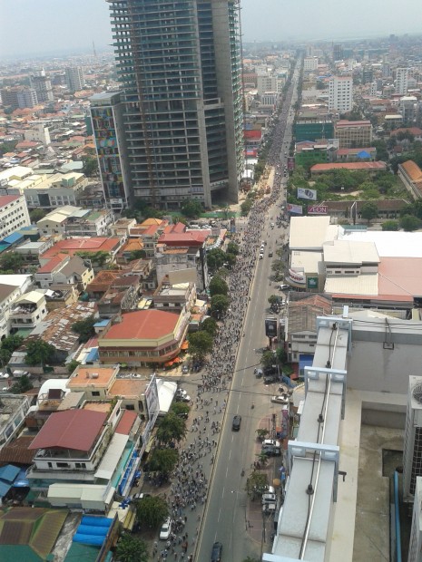 An estimated 25,000 CNRP supporters march down Phnom Penh's Monivong Boulevard on Friday, the final day of the opposition's three-day demonstration during which the party petitioned foreign embassies and the U.N. to help break the current political deadlock. (Licadho)