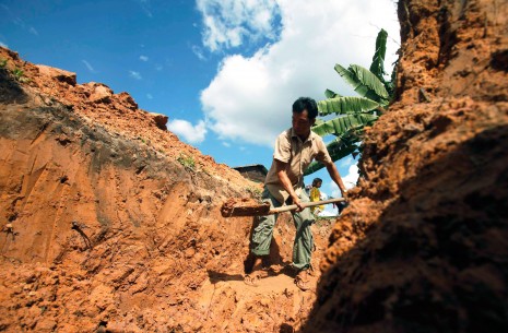 Cambodia Awarded Land Around Preah Vihear 1 A man digs a bunker at his home about 20 kilometers from Preah Vihear temple ahead of the International Court of Justice's ruling Monday over ownership of disputed land adjacent to the temple. (Reuters)