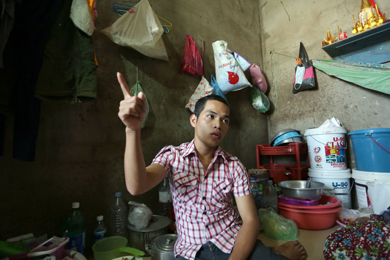 Yon Chea, a 17-year-old garment worker who was among the 23 arrested during the lethal suppression of protesters by military police on January 2 and 3, speaks at his home on Veng Sreng Street in Phnom Penh's Meanchey district Sunday afternoon. (Siv Channa)