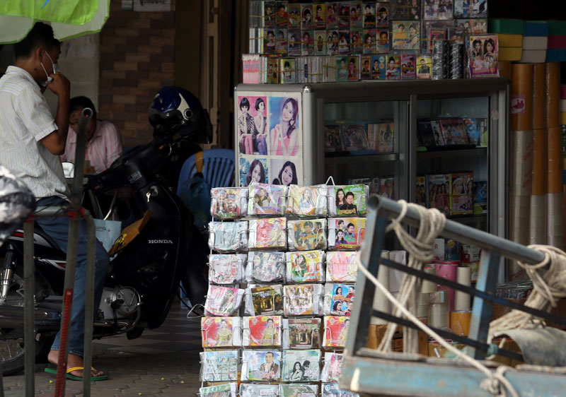 C.D.s and DVDs are on display at a local shop on Friday in Phnom Penh. (Siv Channa)