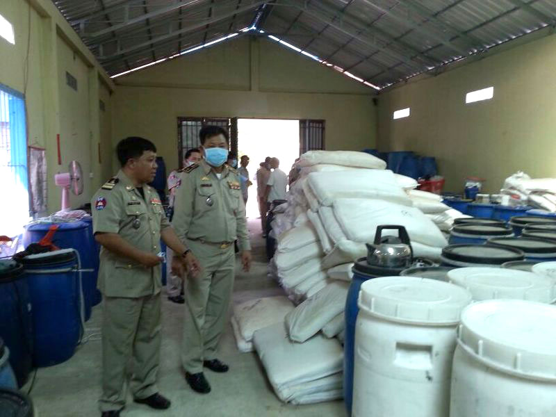 Thirty Tons of Fake Soap Chemicals Seized in Kandal 1 Kandal provincial police inspect barrels containing 30 tons of illicit chemicals used in what police believe was a counterfeit soap-making operation. (In Song)