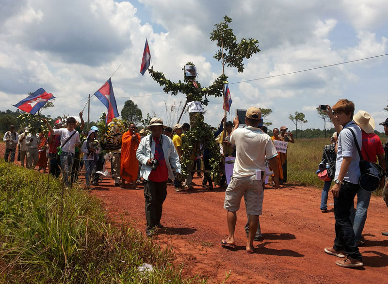 Supporters of Chut Wutty march in Koh Kong province on Saturday to mark the second anniversary of his death. (Chhim Savuth) 