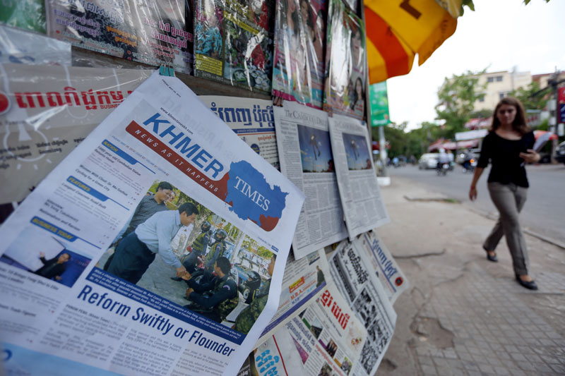The second edition of the Khmer Times is displayed for sale at a newspaper stall along Street 51 in Phnom Penh on Monday. (Siv Channa)