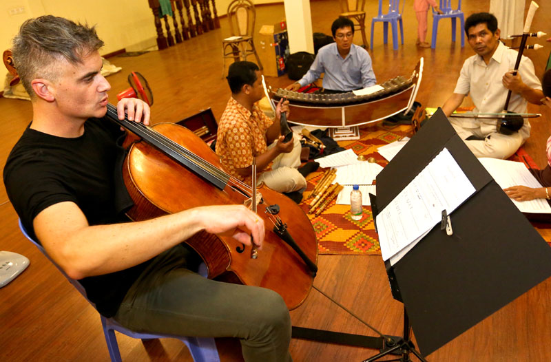 Musicians rehearse for Sunday's concert at Him Sophy's music school. From left, Ashley Brown, Keo Dorivan, Keo Sophy and Him Sophy. (Siv Channa)