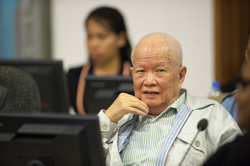 Former Khmer Rouge head of state Khieu Samphan attends the initial hearings in Case 002/02 at the Khmer Rouge tribunal on Wednesday. His co-defendant, Nuon Chea, observed the proceedings from his holding cell. (Extraordinary Chambers in the Courts of Cambodia)