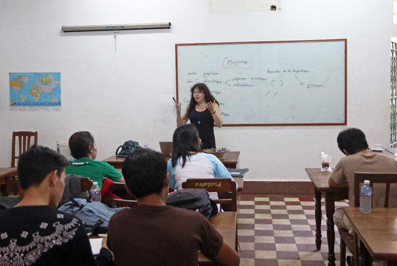 Linguist and professor Helene de Penanros teaches first-year students enrolled in the international bachelor's degree program in the humanities at the Royal University of Fine Arts. (Siv Channa)