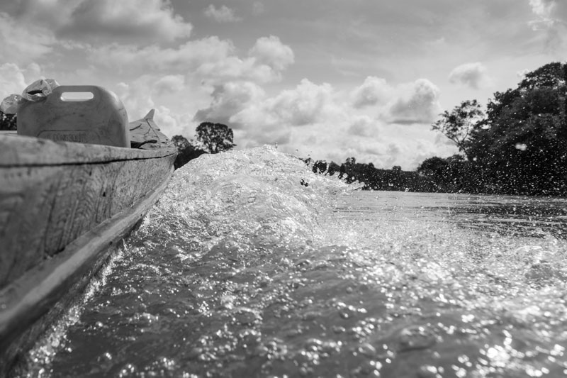 A boat drives on the Sesan river in Stung Treng province. (John Vink)