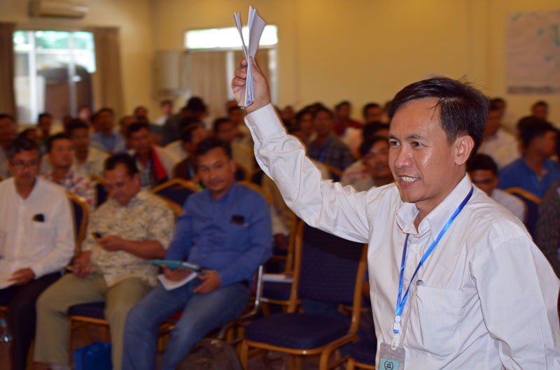 Vorn Pao, president of the Independent Democracy of Informal Economy Association, a labor group consisting mostly of tuk-tuk drivers, casts his vote during the association's general election in Phnom Penh on Thursday. (Alex Consiglio/The Cambodia Daily)