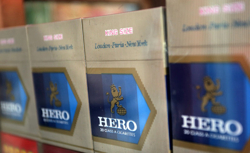 Hero cigarettes are displayed without tax stickers or health warnings at a stand in Phnom Penh. (Siv Channa/The Cambodia Daily)