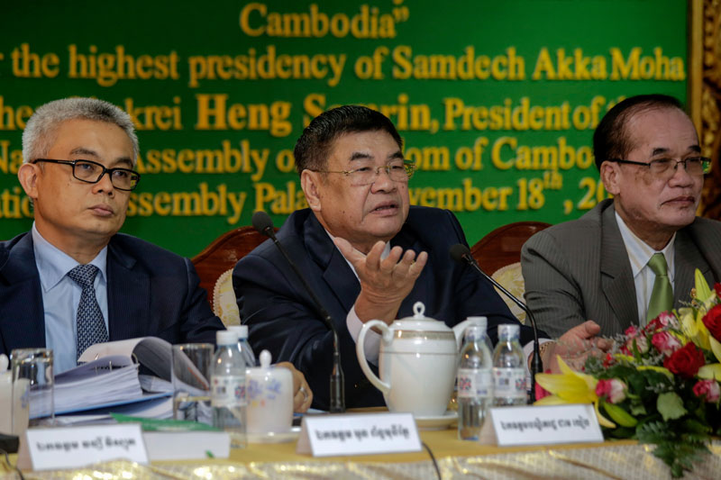 From left: Finance Minister Aun Porn Moniroth, National Assembly finance commission chairman Cheam Yeap and Senate finance commission chairman Chea Cheth participate in a workshop to discuss a draft of next year's national budget at the National Assembly on Tuedsay. (Siv Channa/The Cambodia Daily)