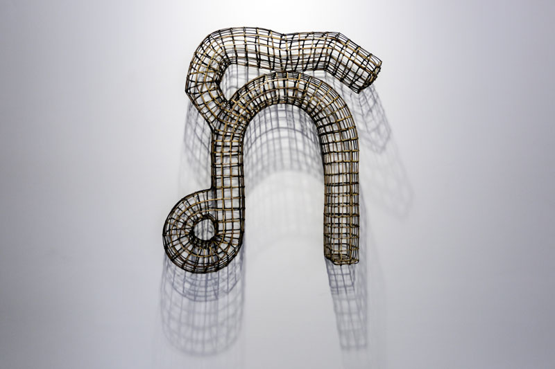 Artist Sopheap Pich's bamboo sculpture depicting the first letter of 'Phnom Penh' in the Khmer script (Siv Channa/The Cambodia Daily)