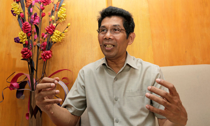 Classical Composer’s CD Commemorates Khmer Rouge Victims 1 Composer Him Sophy speaks to a reporter at his eponymous music school on Wednesday. (Siv Channa/The Cambodia Daily)