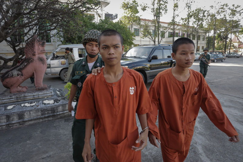 Appeal Court Hears Defrocked Monks’ Bail Request 1 Former monks Khit Vannak, left, and Sang Kosal enter the Appeal Court in Phnom Penh on Tuesday morning for their bail hearing. (Siv Channa/The Cambodia Daily)