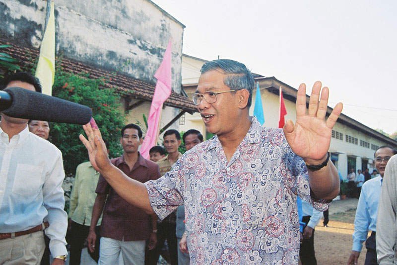 Prime Minister Hun Sen leaves a polling station in Kandal province's Takhmao City after voting in the April 2007 commune council elections. (Heng Chivoan)