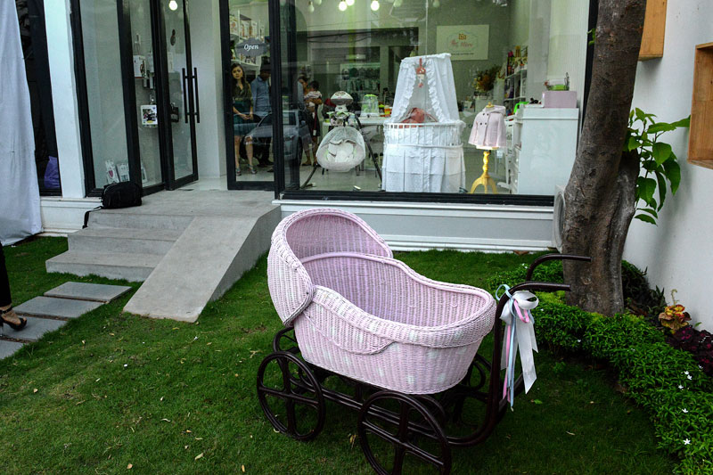 A baby carriage sits outside Mere, a shop in Phnom Penh that sells high-end maternity and baby products, on Monday. (Matt Walker)