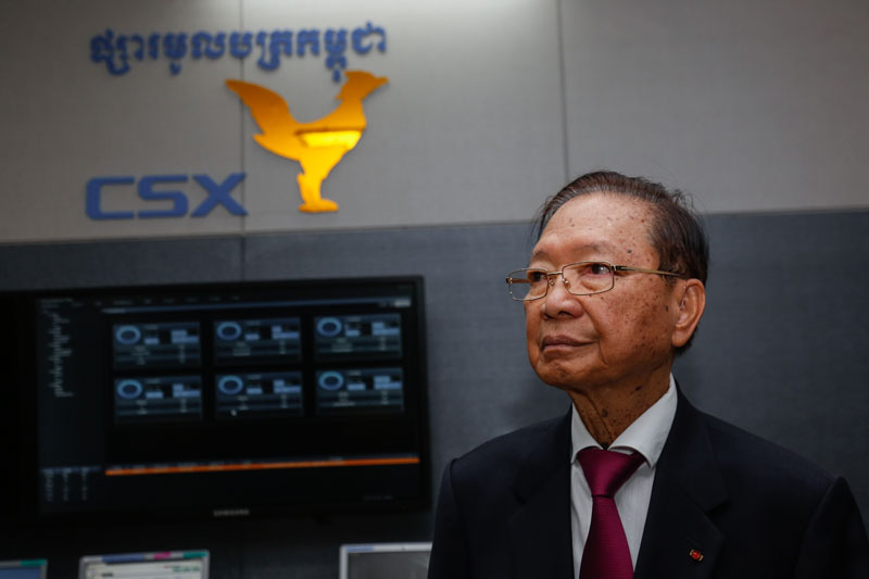 Deputy Prime Minister Keat Chhon, who was finance minister when the Cambodia Securities Exchange launched in 2012, attends the opening of the bourse's new building Thursday in Phnom Penh. (Siv Channa/The Cambodia Daily)