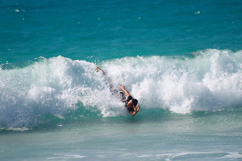 Katherine Grgich bodysurfs on a wave in Kona, Hawaii, in 2012 (The Grgich Family)