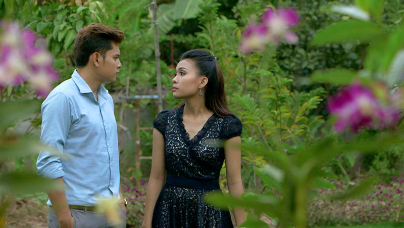 Yim Sambath, left, and Chan Sophanika in a scene from 'Day in the Country.' (Khmer Mekong Films)
