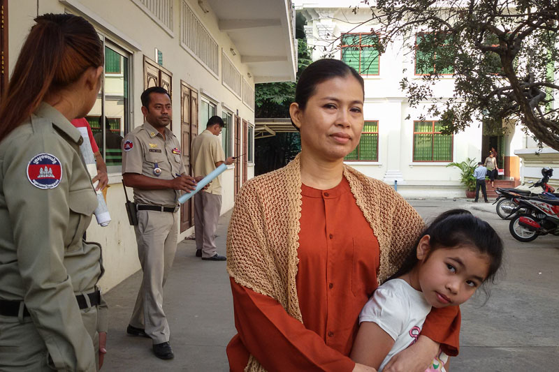 Lay Huong embraces her daughter outside the Appeal Court in Phnom Penh on Tuesday after having her bail request denied. (Khy Sovuthy/The Cambodia Daily)