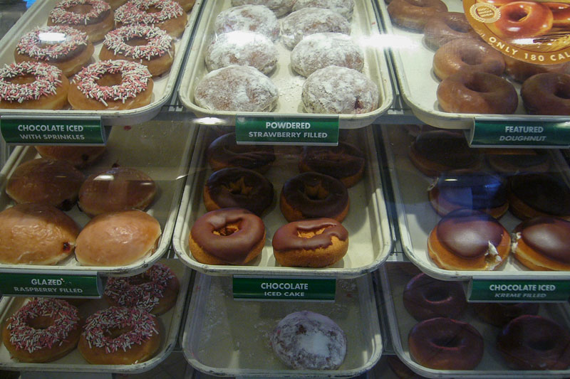 A selection of Krispy Kreme doughnuts on display in a shop (Creative Commons)