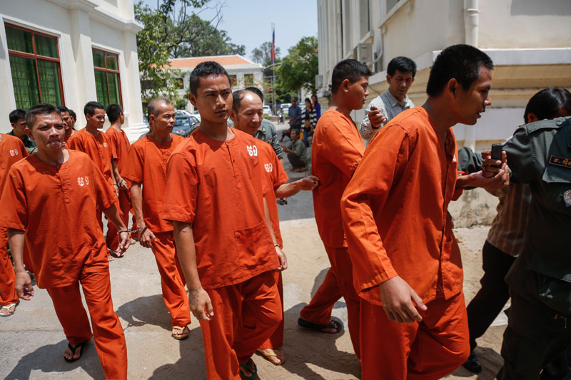 The 10 jailed members of the Khmer National Liberation Front leave the Appeal Court in Phnom Penh on Tuesday morning. (Siv Channa/The Cambodia Daily)