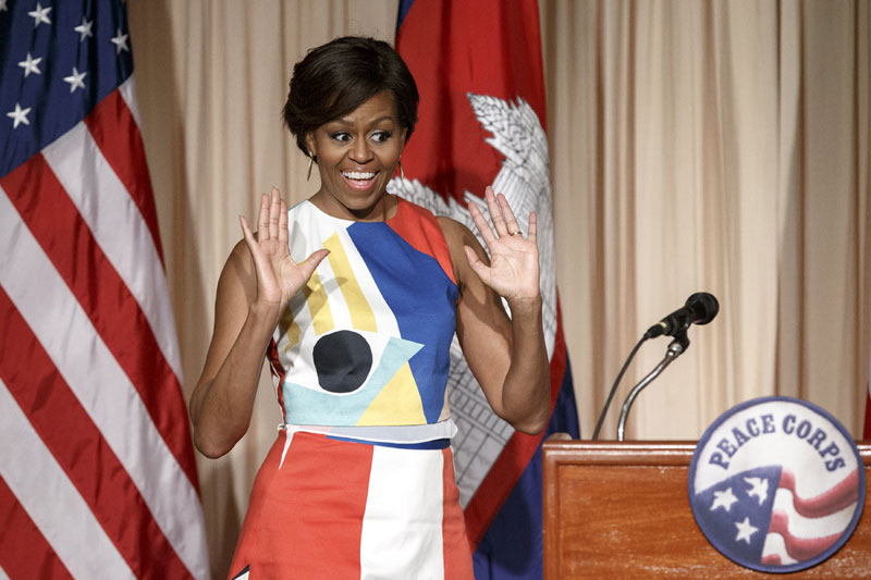 US first lady Michelle Obama greets Peace Corps volunteers in Siem Reap province on March 21. (Reuters)