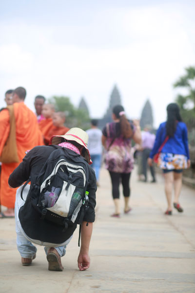 Svay Sareth measures the path at Angkor Wat on February 22 for 'Prendre les mesures,' exhibited as part of the 'Secret Archipelago' show at the Palais de Tokyo. (Ly Mardi)