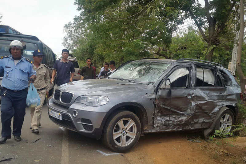 Prince Norodom Ranariddh's BMW SUV is seen on the side of National Road 7 in Kompong Cham province after it was hit by a truck on Saturday in a photograph provided by provincial traffic police.