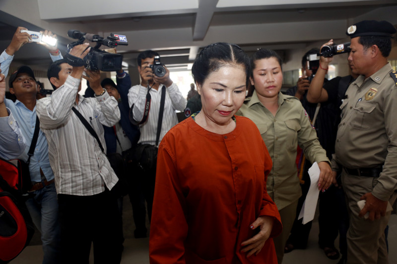 Keo Sary on Friday enters the Phnom Penh Municipal Court, where her trial for possession of illegal firearms was delayed. (Siv Channa/The Cambodia Daily)