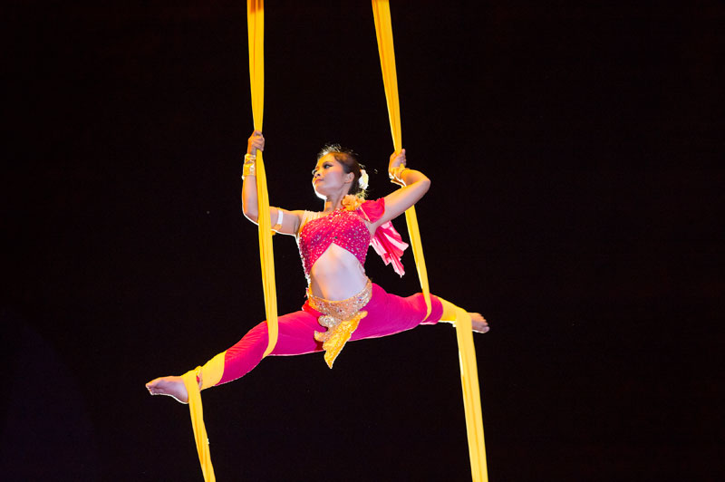 An artist from the National Circus School performs a flying curtain-ribbon number (Anders Jiras)