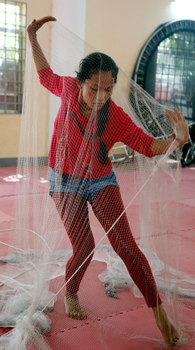 Chumvan Sodhachivy, also known as Belle, rehearses the dance ‘Rank 21’ on Tuesday. (Siv Channa/The Cambodia Daily)