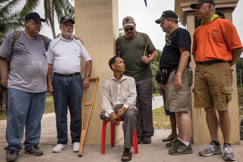 Former Koh Tang naval commander Em Son answers questions on Tuesday from American veterans of the 1975 Battle of Koh Tang, during which 41 US servicemen were killed by Khmer Rouge forces on the island. (Ben Woods/The Cambodia Daily)