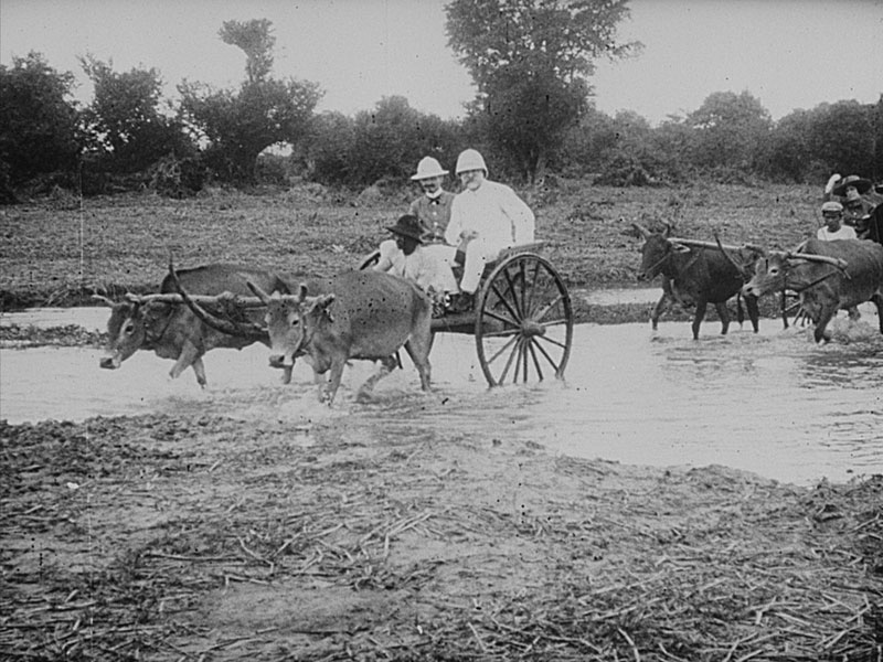 Frenchmen travel by oxcart in Cambodia more than a century ago in a still image from Rithy Panh's new film 'France is Our Motherland.'