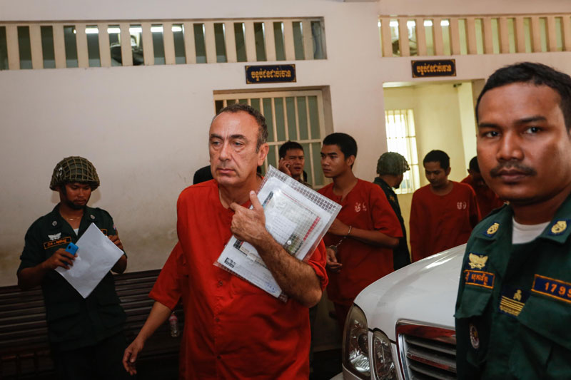 George Moussallie arrives Thursday at the Phnom Penh Municipal Court, where he was sentenced to five years in prison for sexually abusing six boys. (Siv Channa/The Cambodia Daily)