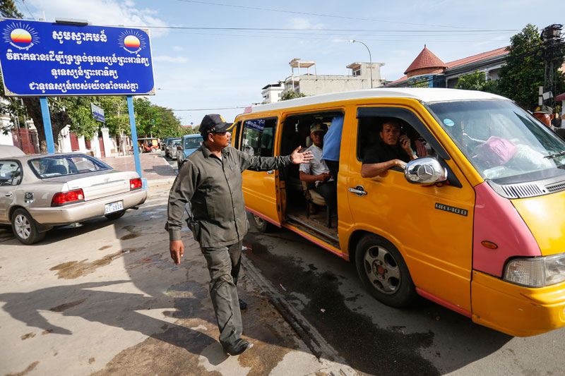 CNRP members leave the opposition party’s Phnom Penh headquarters Thursday after coming from Svay Rieng province to request the removal of CNRP lawmaker Kong Sophea from his provincial party post. (Siv Channa/The Cambodia Daily)