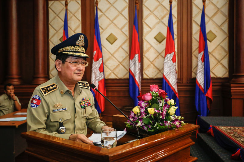 General Sok Phal, chief of the Interior Ministry's immigration department, addresses officials Wednesday during a meeting at the ministry in Phnom Penh. (Siv Channa/The Cambodia Daily)