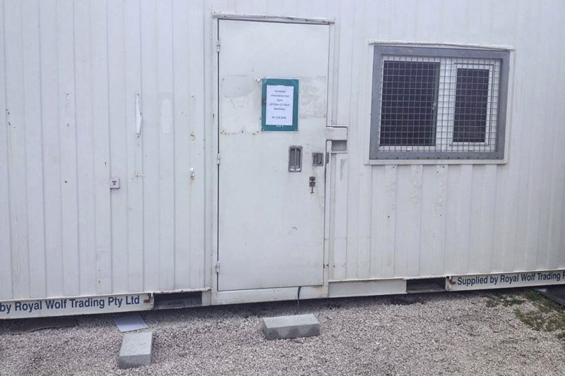 The 'Cambodia Information Hub' that Australia set up on Nauru for refugees interested in resettling in Cambodia. The sign on the door says the hub is open on weekdays from 10:30 a.m. to 12:30 p.m. (Refugee Action Coalition)