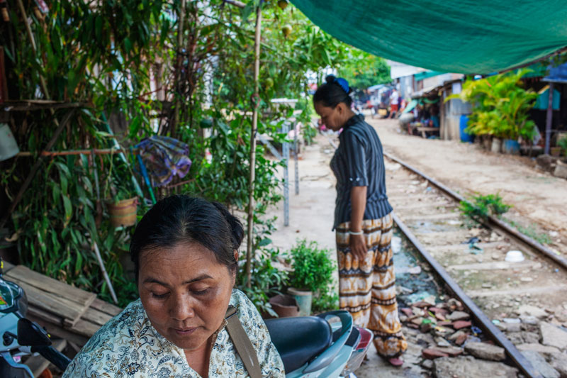 Meng Kuon, left, near her home in Phnom Penh's Russei Keo district Wednesday (Jens Welding Ollgaard/The Cambodia Daily)