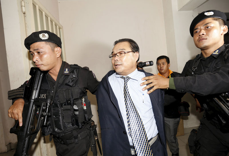 Opposition Senator Hong Sok Hour arrives at the Phnom Penh Municipal Court on Saturday after being arrested in Sen Sok district. (Reuters)