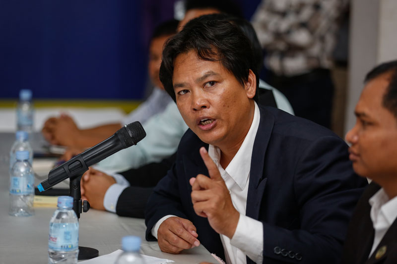 Police Investigate Death Threat Against Border Researcher 1 Sok Touch speaks at the CNRP’s headquarters in Phnom Penh on August 10, during a ceremony in which the opposition party handed over its border maps. (Siv Channa/ The Cambodia Daily)