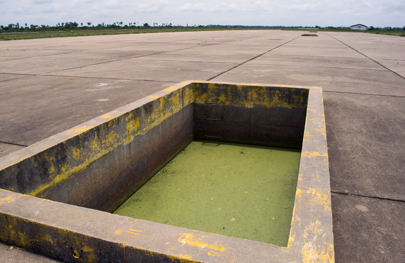 A water pit built as a safety measure in case of aircraft fire (Peter Ford/The Cambodia Daily)