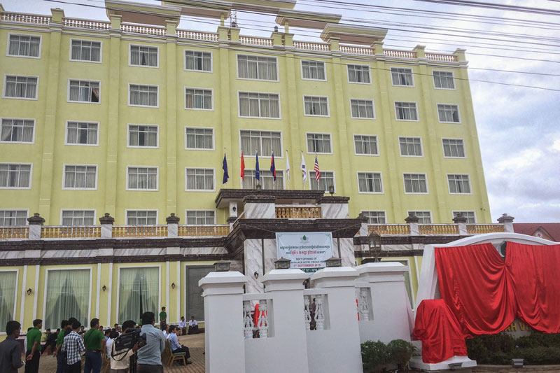 Reporters and guests on Monday gather for the opening of a six-story hotel constructed by the Cambodian Red Cross in Preah Vihear City. (Try Vichika )